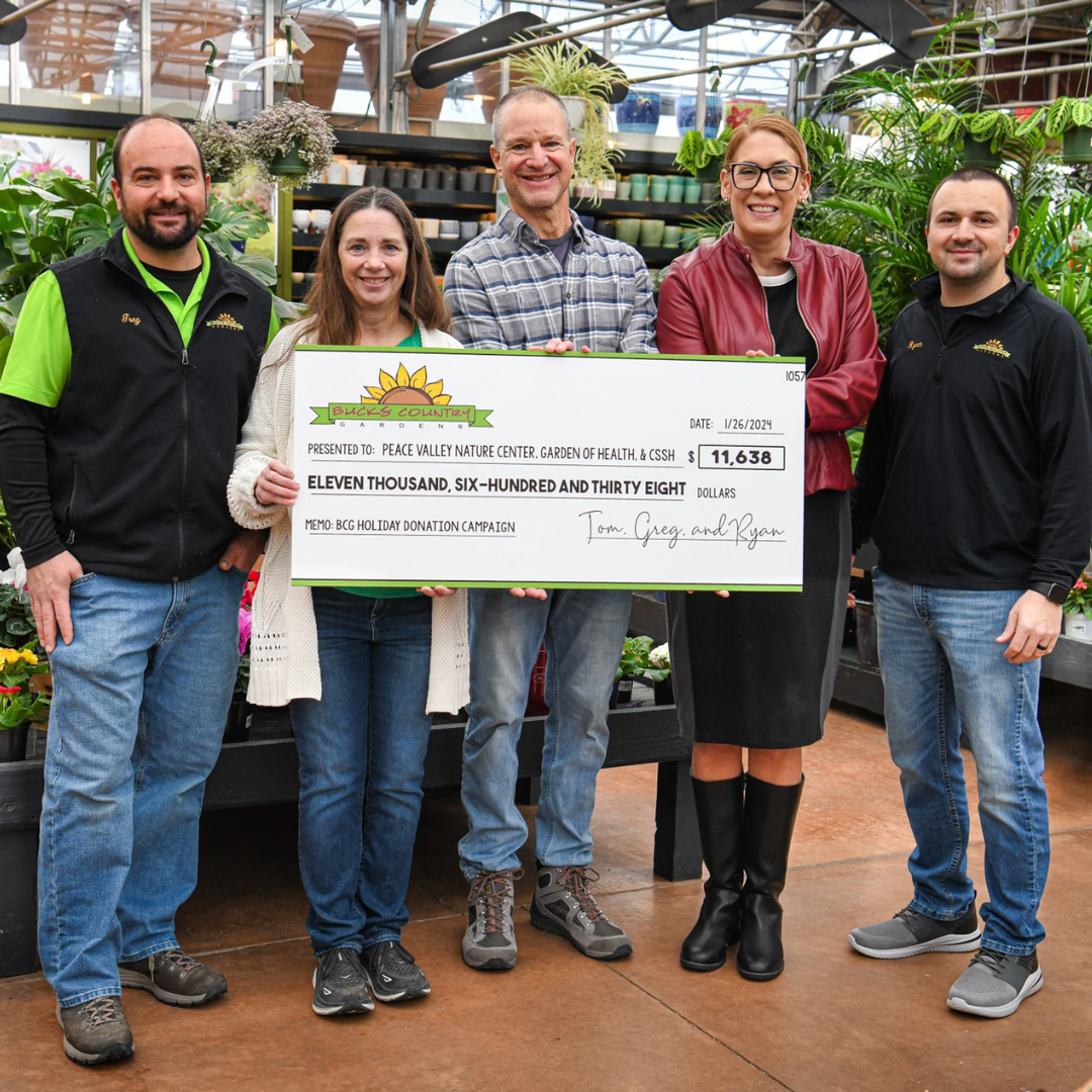 Andy Jarin accepts a donation from our friends at Bucks Country Gardens